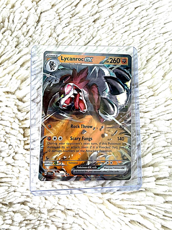 Lycanroc ex holo card the fierce wolf Pokémon aggressive battle-ready pose.