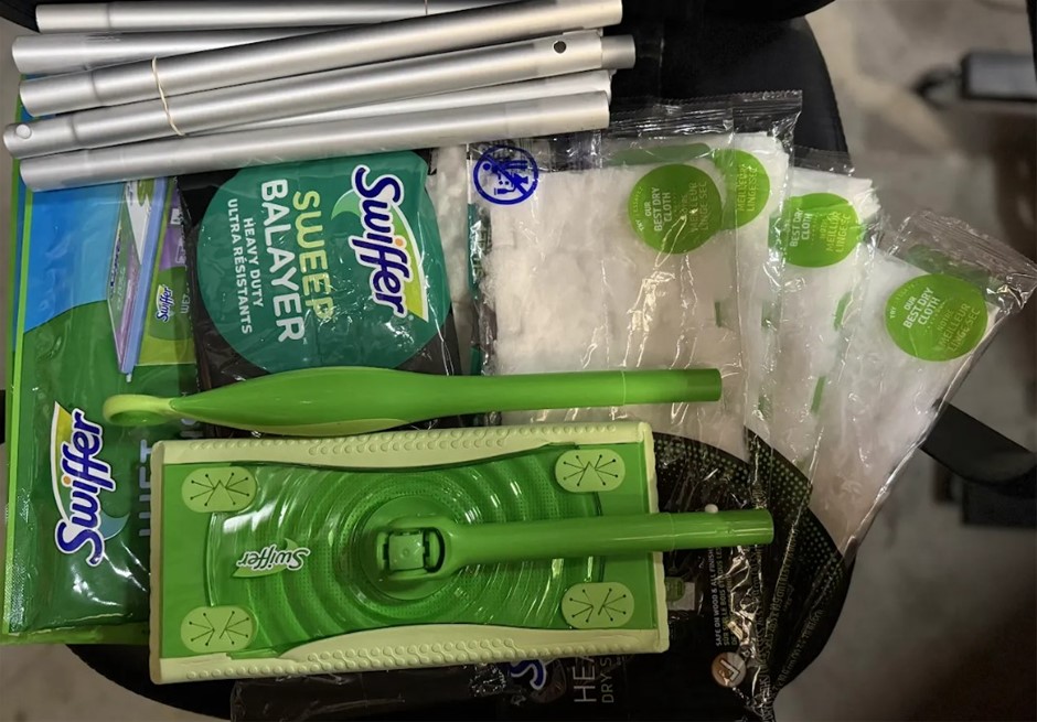 Assorted Swiffer floor cleaning bundle featuring sweeper mop components, he