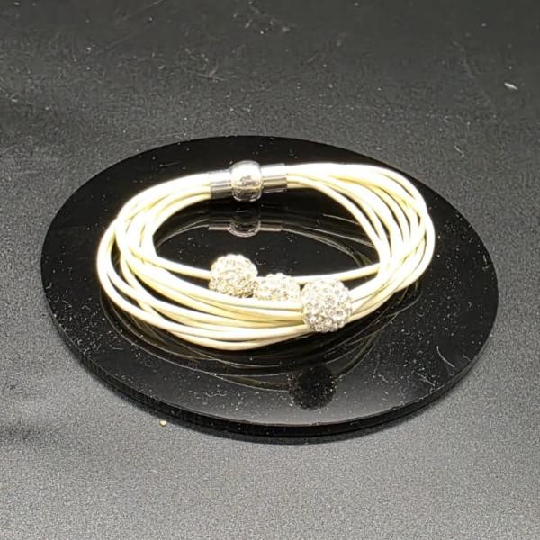 Designer Simulated Diamond Triple Ball Bracelet with Multi Cream Bands