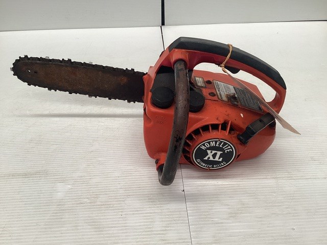 <p>Homelite XL Chainsaw </p>