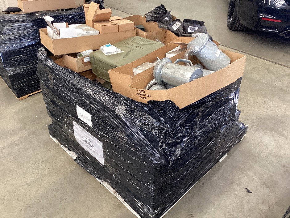 <p>Pallet containing pressure gauges, water Jerry cans, oil cans with funne