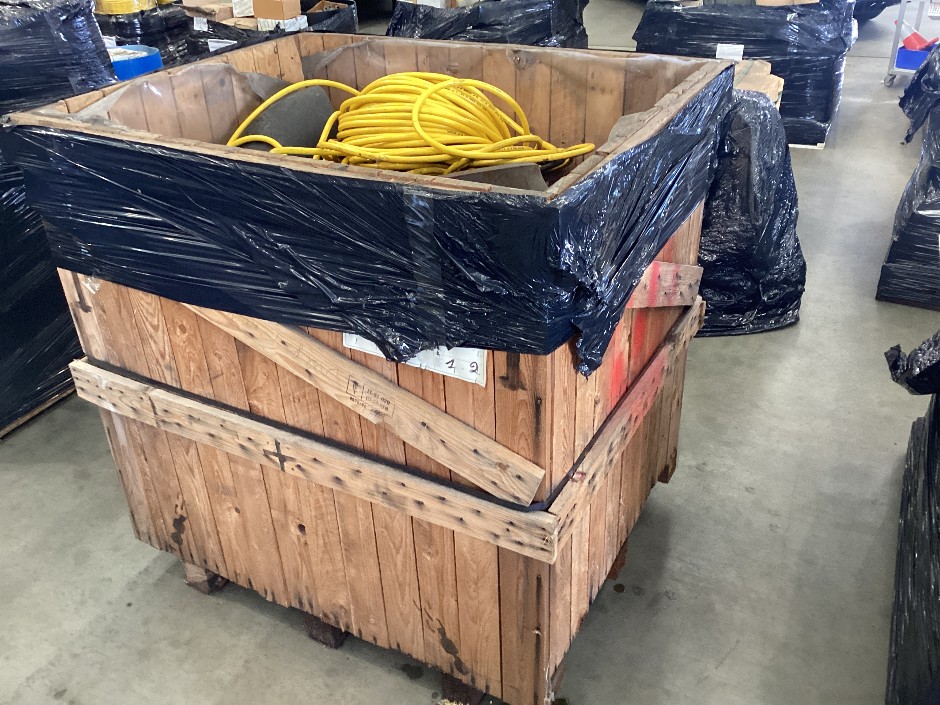 Wooden Crate containing pvc air hose, metal pipe fittings