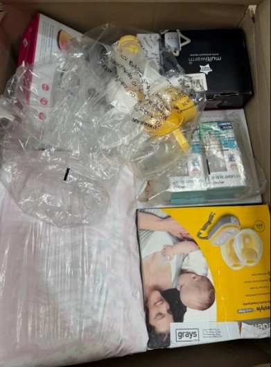 Assorted Box of Baby Items incl: Breast Pump, Bottles. NB: Items may not be