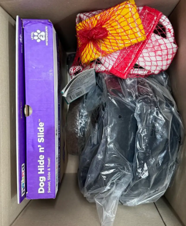 Assorted Box of Pet Products, includes Toys, Bowls, Puzzles and more. NB: I