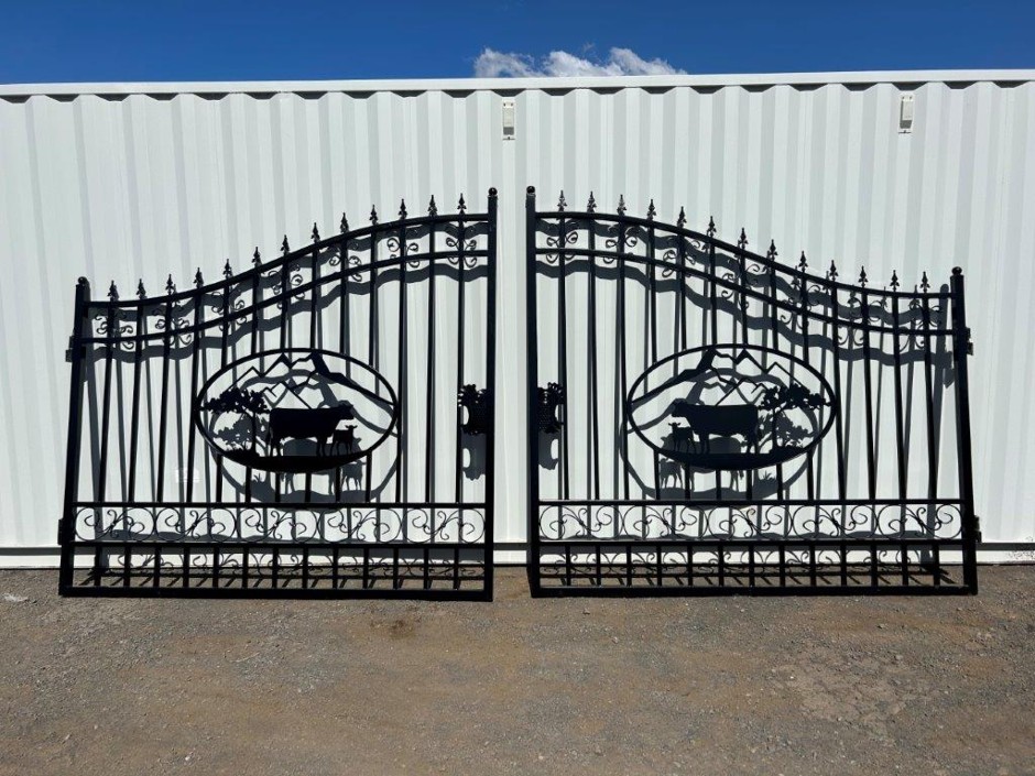 <p>Set of 2 9FT Cow Design Wrought Iron Style Gates (Unused)</p>