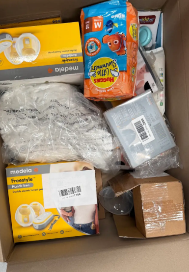 Assorted Box of Baby Items, incl: Medela Breast Pumps, Huggies Little Swimm