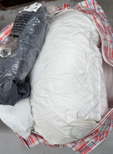 Bag of Pillows, Doonas and more. NB: Items may not be in original packaging