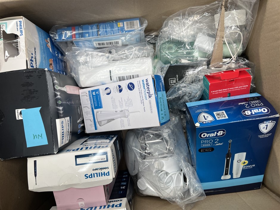 Assorted Box Of Electric Toothbrushes/Waterpiks. NB: Photo as is. Some Not