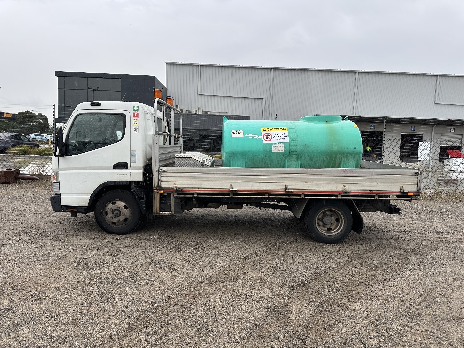 2016 Mitsubishi Fuso Canter 615 4x2 Tray Truck With 3000L Water Tank