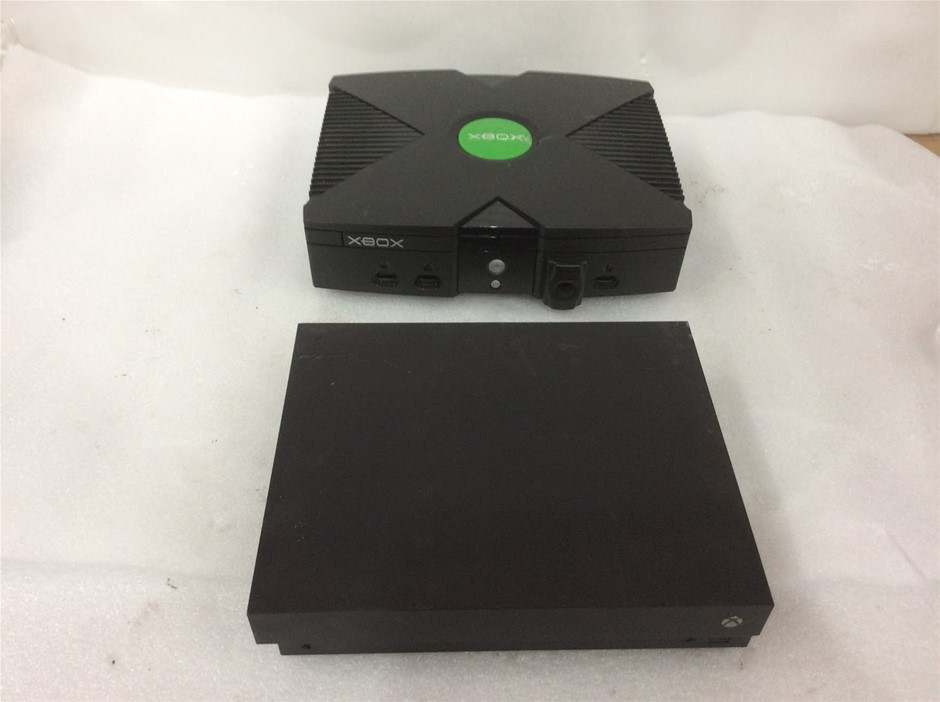Microsoft Xbox One X And Original Xbox Video Game Consoles