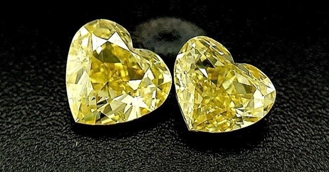 0.52 & 0.55 Carat Fancy Intense yellow diamond GIA graded Diamond