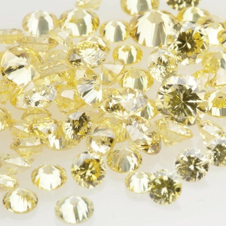 0.14 TCW yellow various round diamond